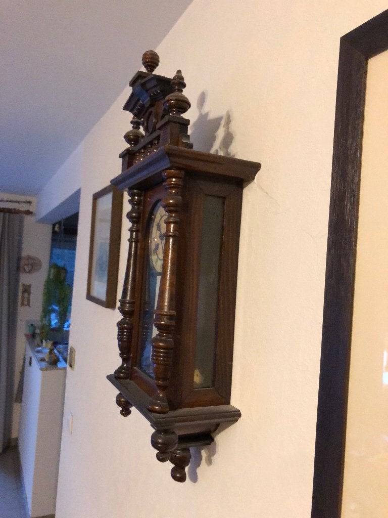 120 jaar oude hangklok., Ophalen