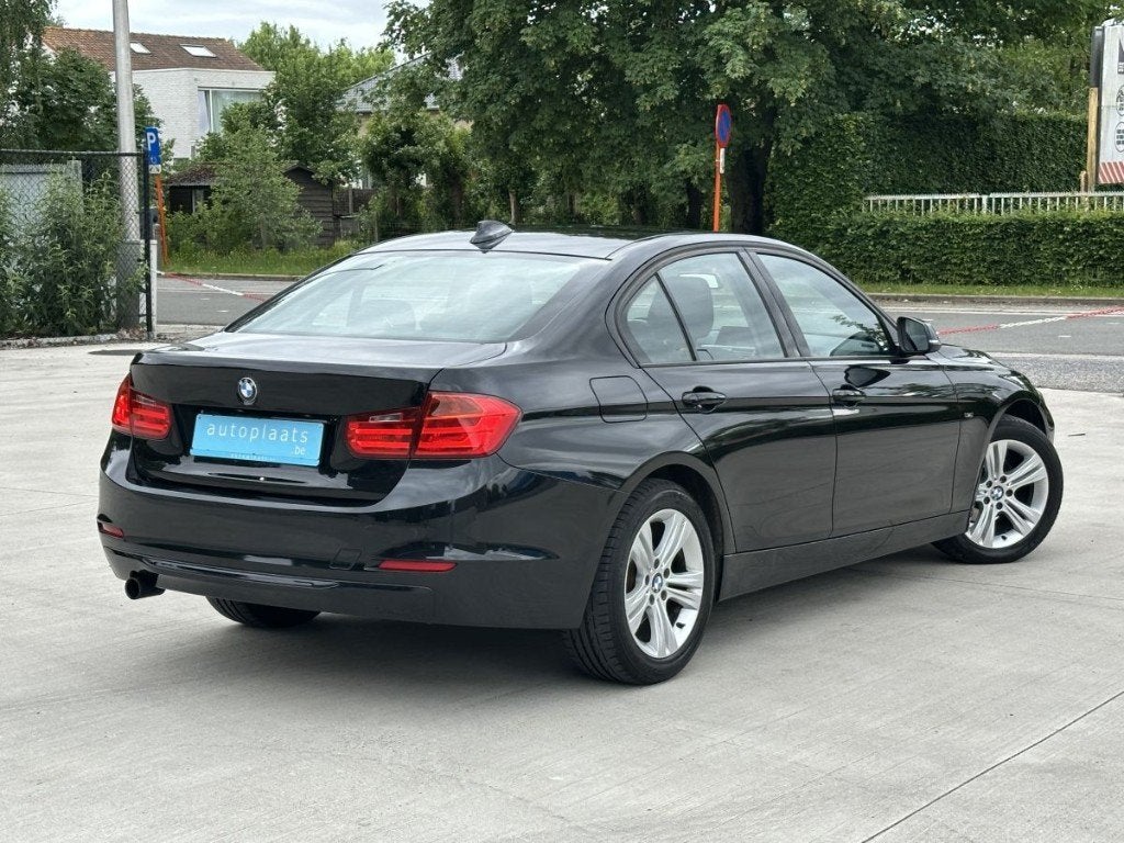 BMW 316i Berline Sport Line 66372km Eerste eigenaar, Auto's, BMW, 100 kW, Dealer onderhouden, Start-stop-systeem, Zwart