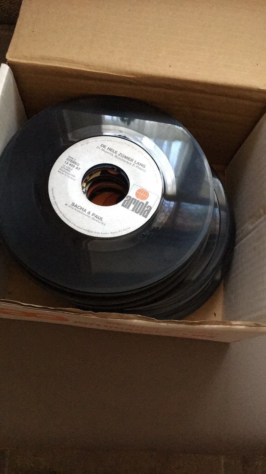 500 oude vinyl singles, Ophalen