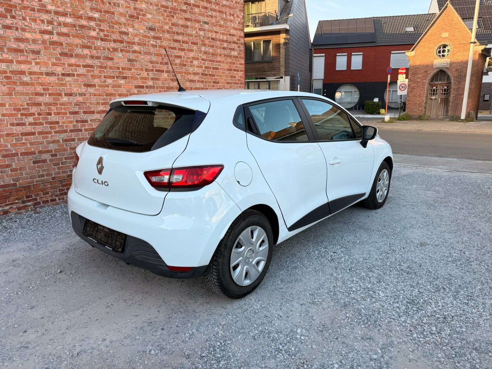 Renault Clio 12/2015 Benzine Euro 6b, Auto's, Stof, 1198 cc, Wit, Bedrijf