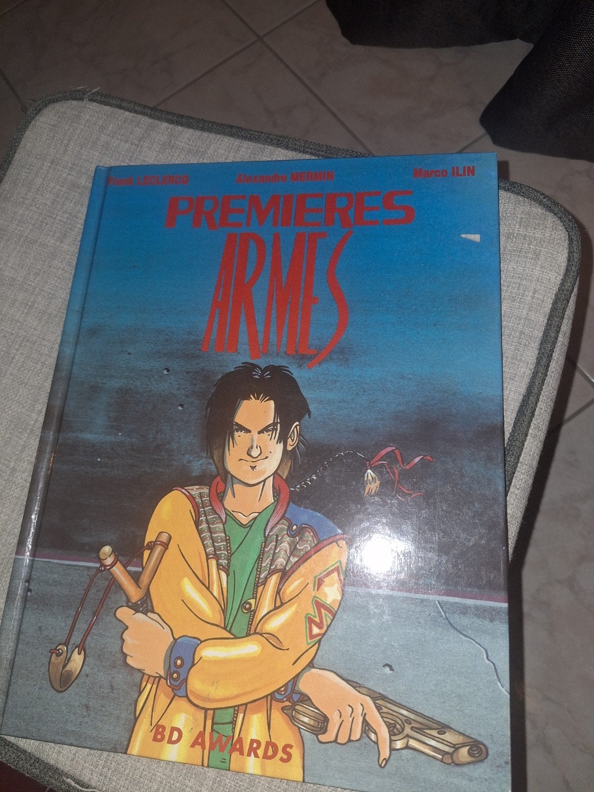 Première Arme Première édition, Une BD, Comme neuf