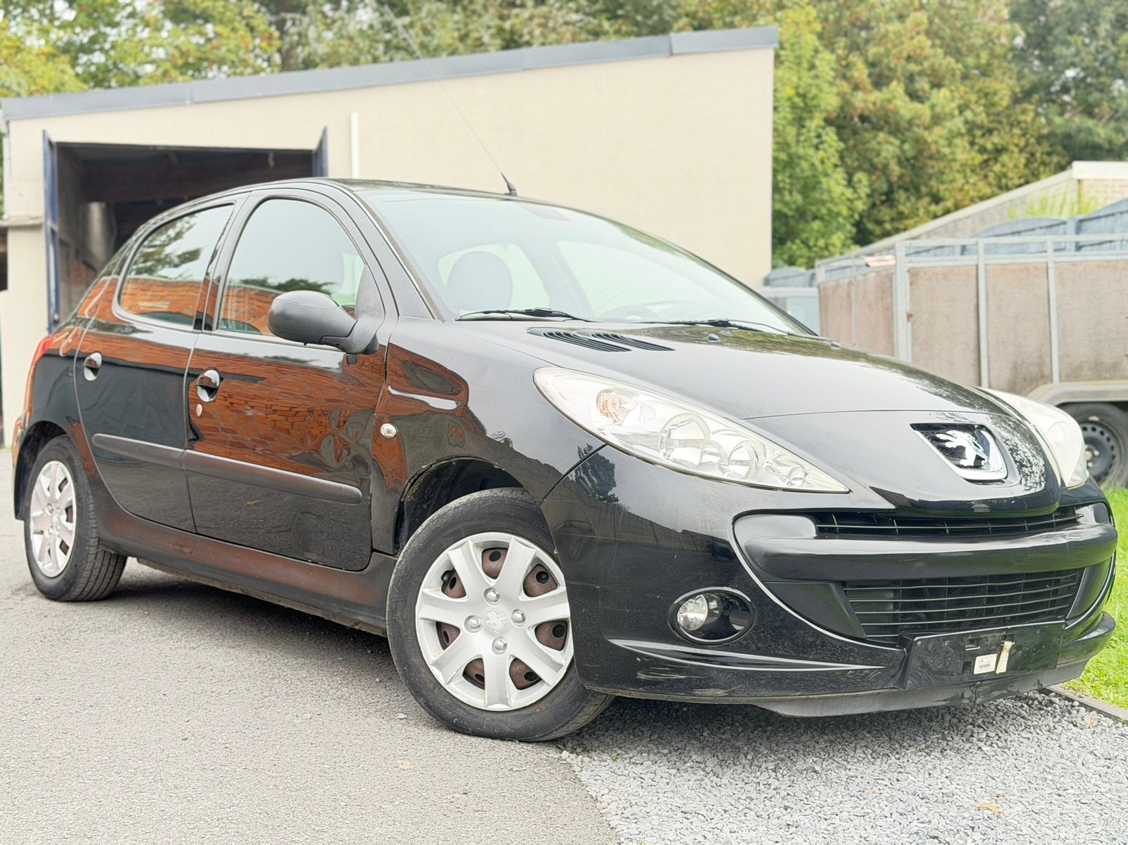 Peugeot 206+ 1,1cc Benzine 2010 met controle en carpaas, Auto's, 206+, Stof, Verwarmde buitenspiegels, Zwart
