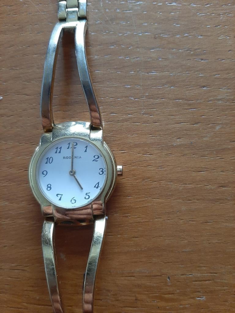 Montre classique pour femme Rodania en or, Bijoux, Sacs & Beauté, Accessoires Autre, Enlèvement ou Envoi, Utilisé