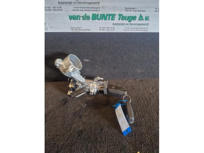 Kontaktslot + Sleutel van een Opel Corsa, Ophalen of Verzenden, 3 maanden garantie, Gebruikt, Opel