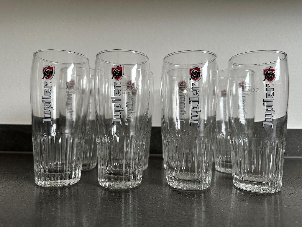 Lot van 12 Jupiler glazen, Ophalen, Zo goed als nieuw, Bierglas