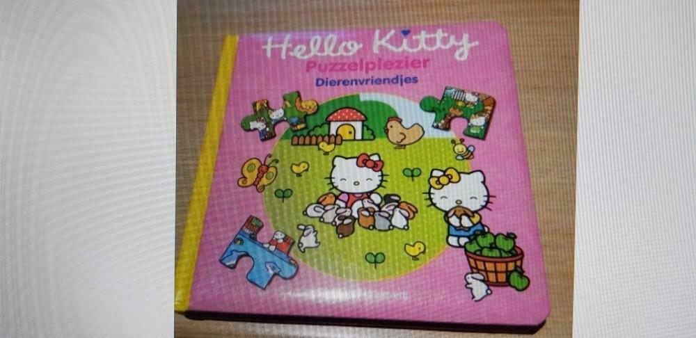 Hello Kitty - boek/ 5 puzzels van 16 stuks, Ophalen, Zo goed als nieuw
