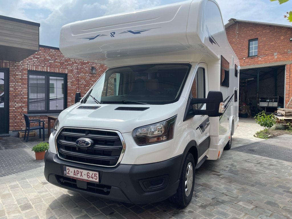 TE HUUR Mobilhome Ford Rimor Evo Sound Alkoof voor 7 pers!, Caravanes & Camping, Siège de train, 6 à 7 mètres, Boîte manuelle