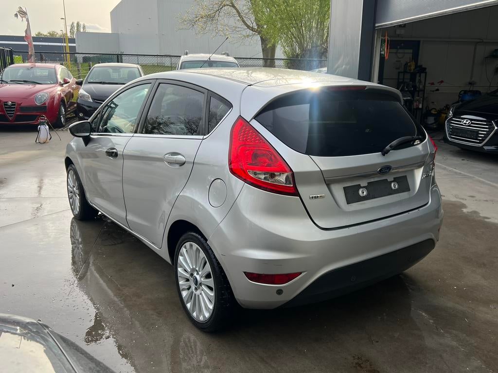Ford Fiesta 1.4TDCI Titanium 2009 Airco, Auto's, 50 kW, 4 cilinders, 110 g/km, https://public.car-pass.be/vhr/853c58d3-9fa2-48dd-b435-a4574e56b40b