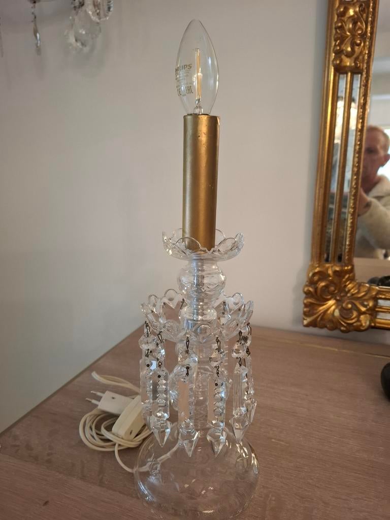 Kristallen lampje, Ophalen