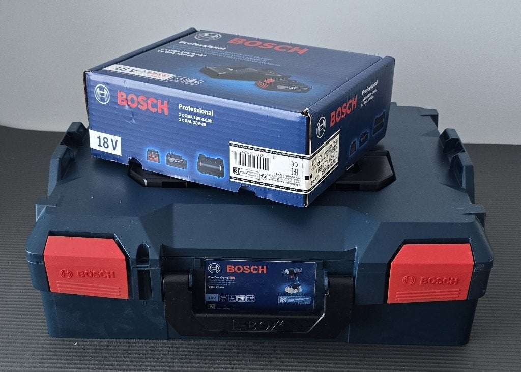 Nieuw - Bosch Pro 18V Slagmoer + Accu + Oplader + Garantie, Ophalen of Verzenden, Nieuw