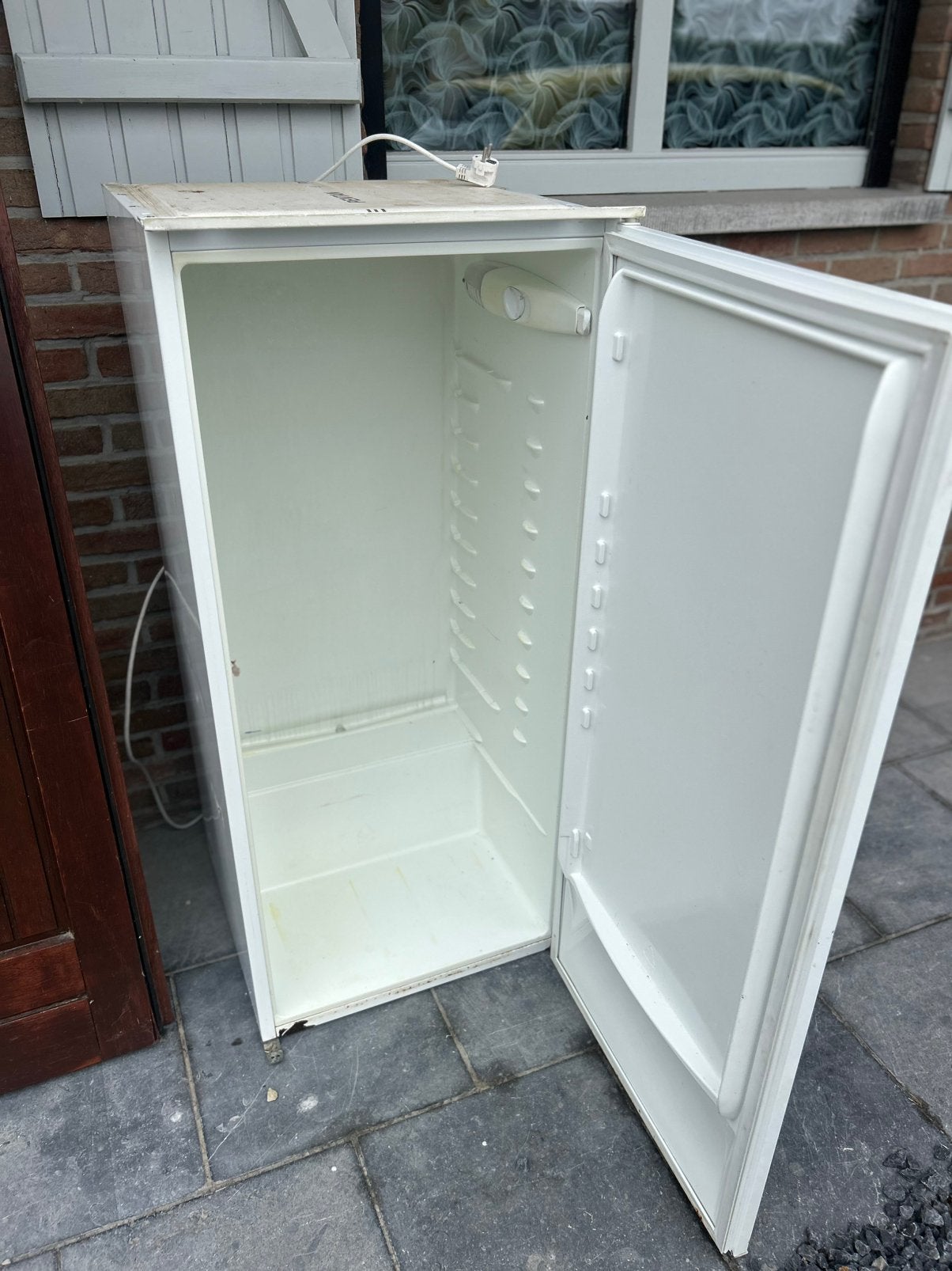Gratuit frigo, Ophalen