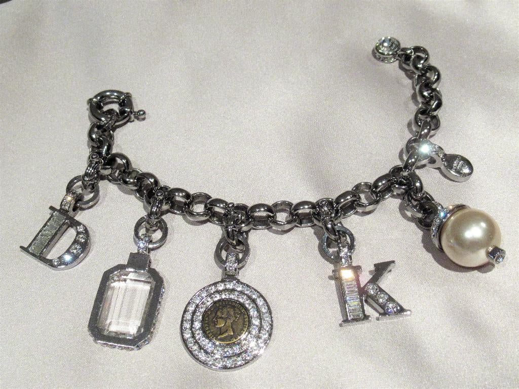 Dyrberg/Kern bedelarmband met kristallen, Verzenden, Zo goed als nieuw, Zilver, Met bedels of kralen