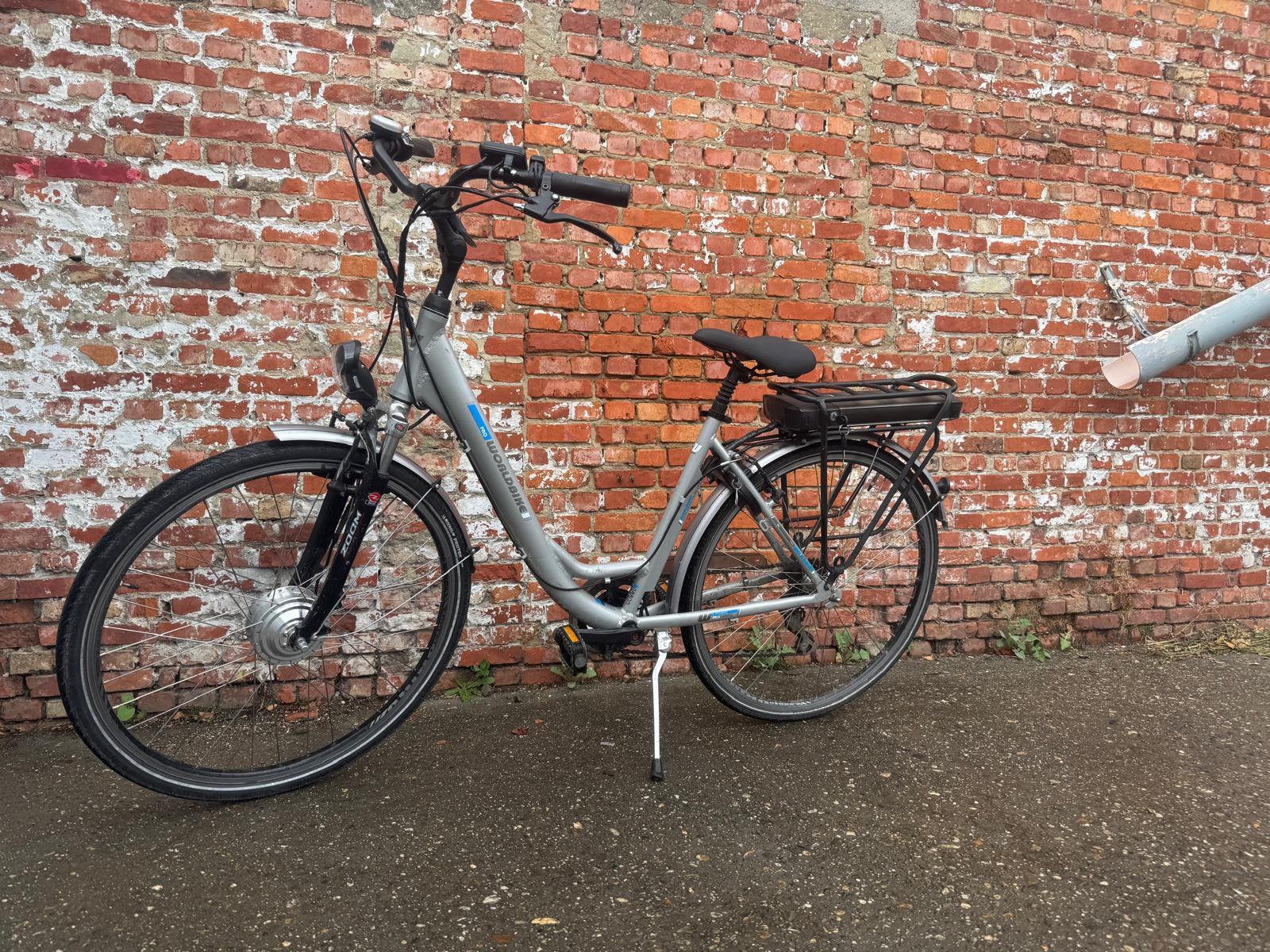 VÉLO ÉLECTRIQUE WORLDBIKE AVEC MOTEUR AVANT, Enlèvement, Comme neuf