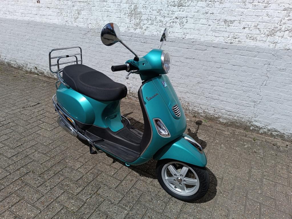 Vespa lx prachtige azuurblauwe kleur, Fietsen en Brommers, Ophalen