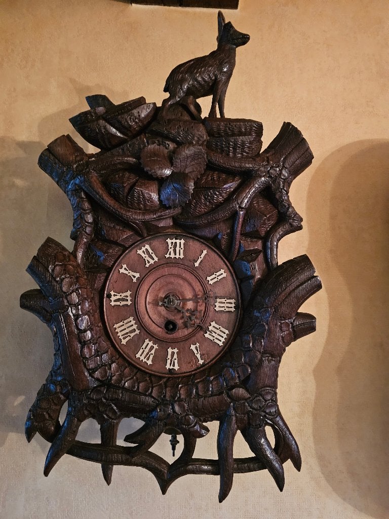 Antieke houten jachtklok, Ophalen