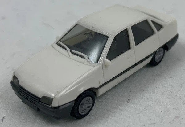 Herpa Opel Kadett E sedan 1:87 modelauto, Hobby en Vrije tijd, Modelauto's | 1:87, Verzenden, Zo goed als nieuw, Auto, Herpa