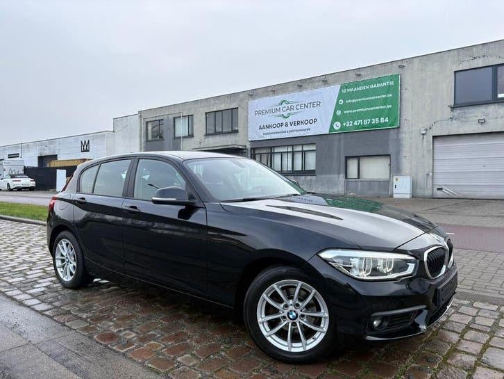 BMW 116i | 12 Maanden Garantie | 106 Dkm | Benzine | 2018 |, Auto's, Voorwielaandrijving, Zwart, Bedrijf, Spraakbediening