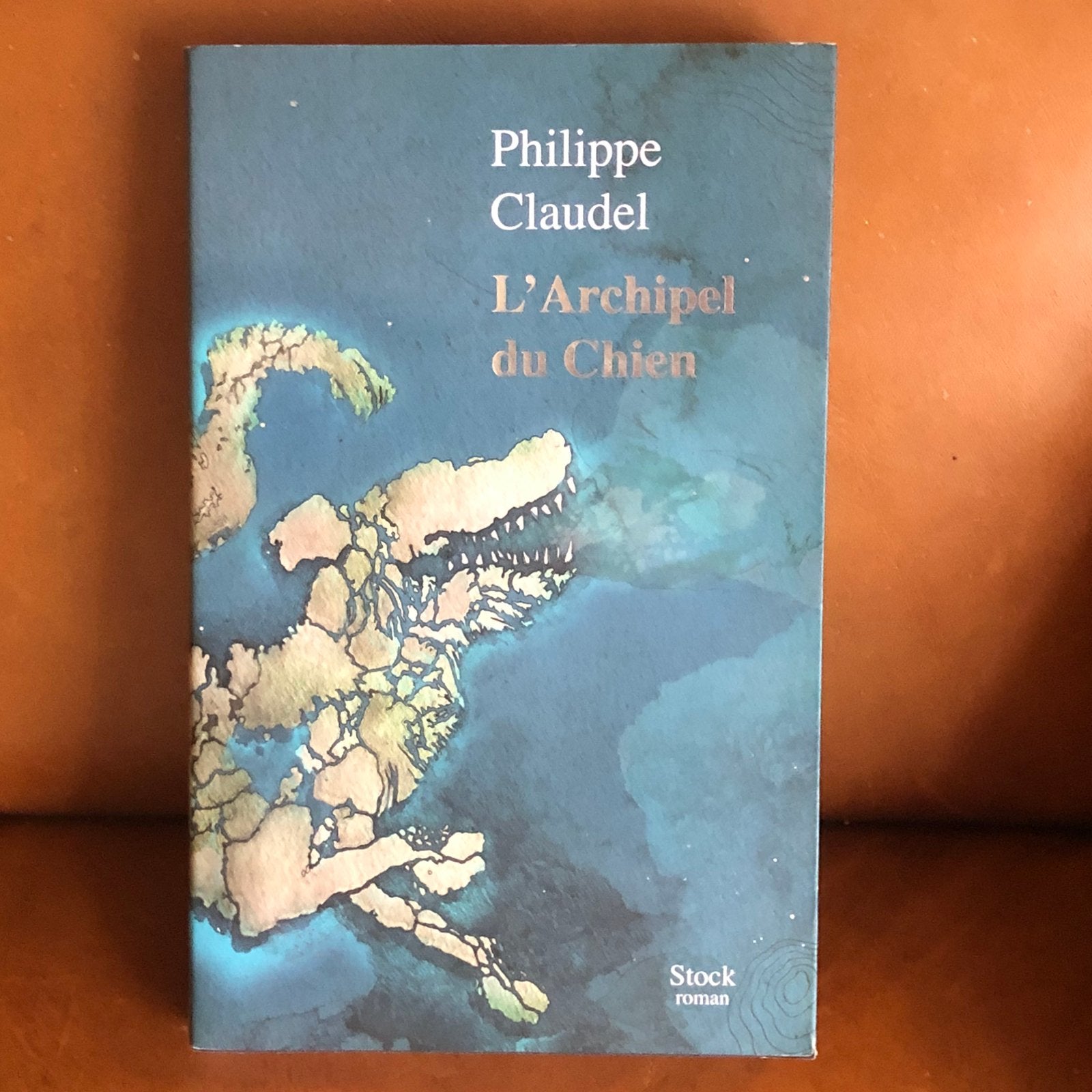 De hondenarchipel - Philippe Claudels, Ophalen