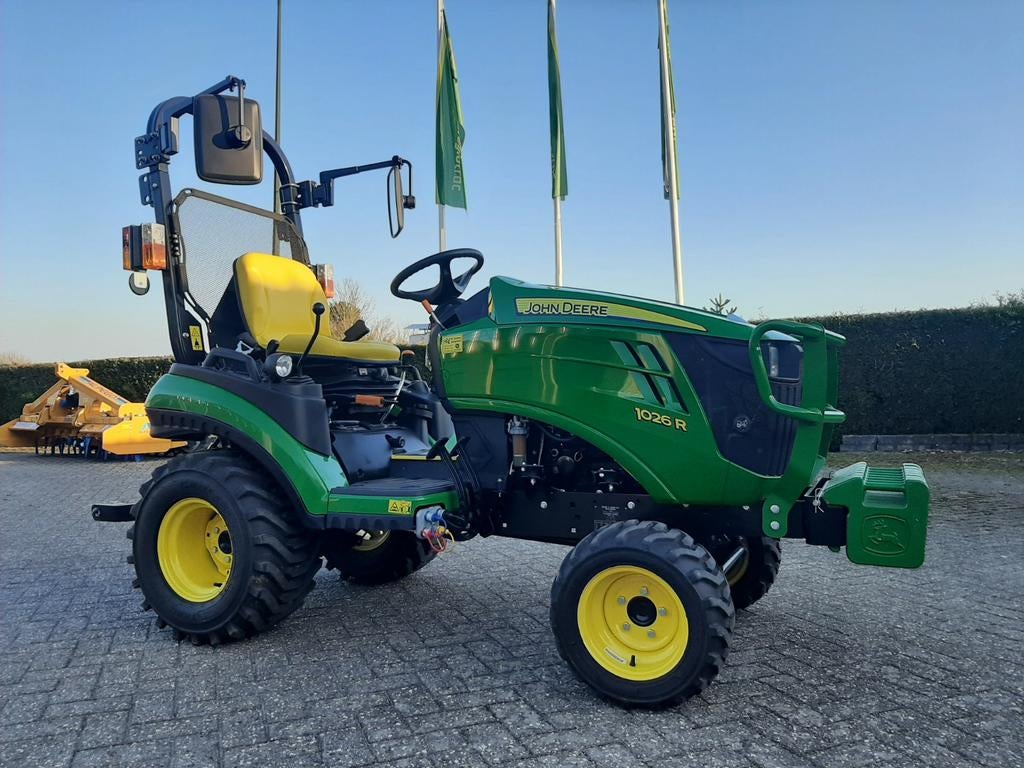 John Deere 1026R Als nieuw., Enlèvement
