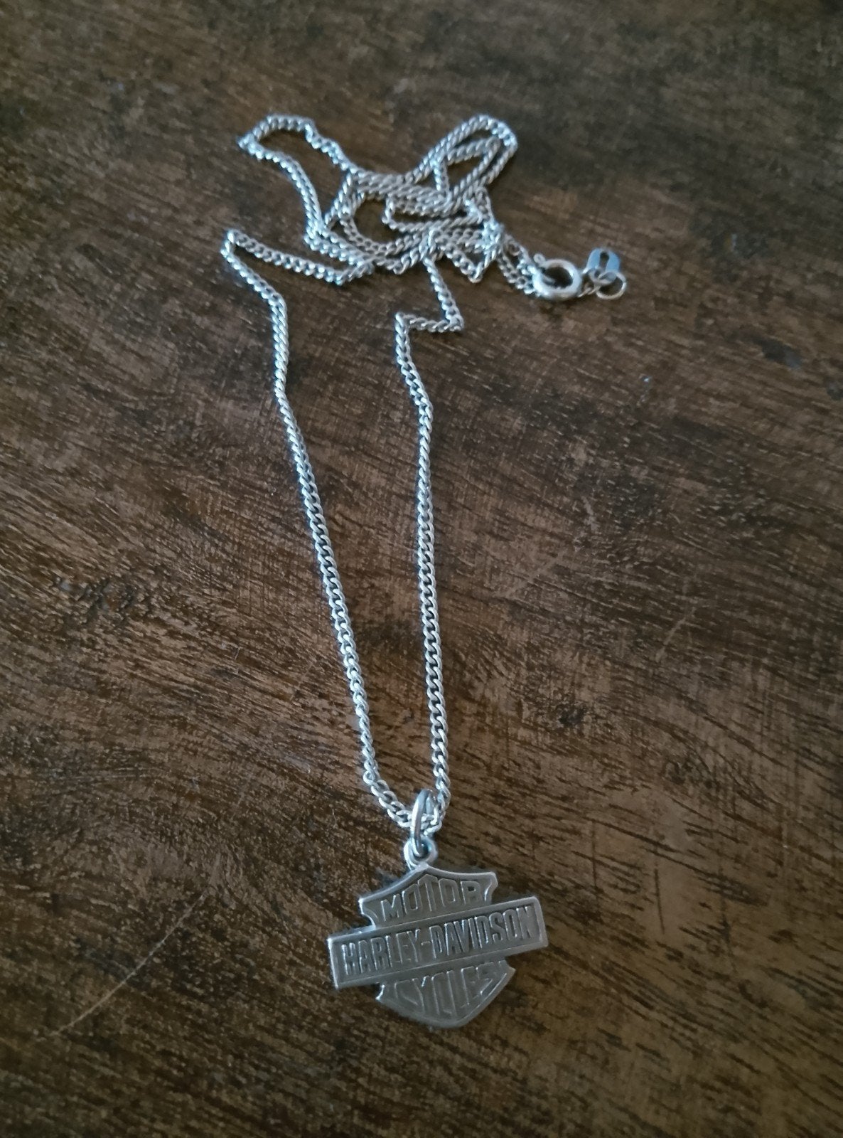 zilveren ketting met Harley Davidson hanger, Ophalen