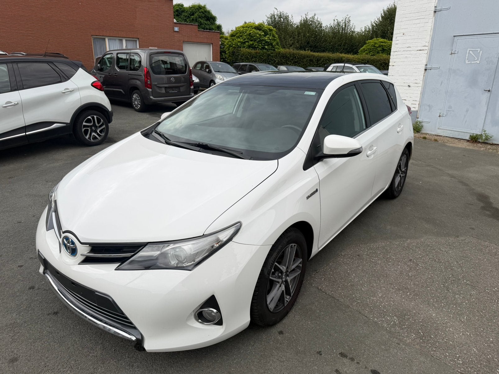 Toyota Auris 1.8 hybride E-CVT actief, Automaat, 4 cilinders, Wit, Bedrijf