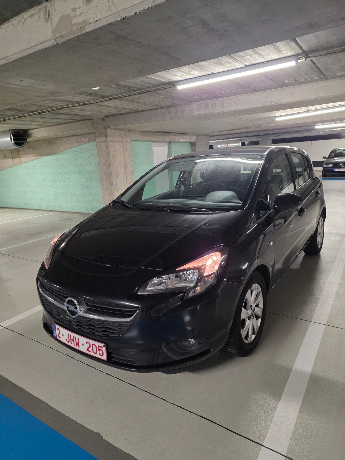 Opel Corsa e 1.2 Benzine 2015 Airco euro 6b, Auto's, Voorwielaandrijving, Stof, Euro 6, Zwart