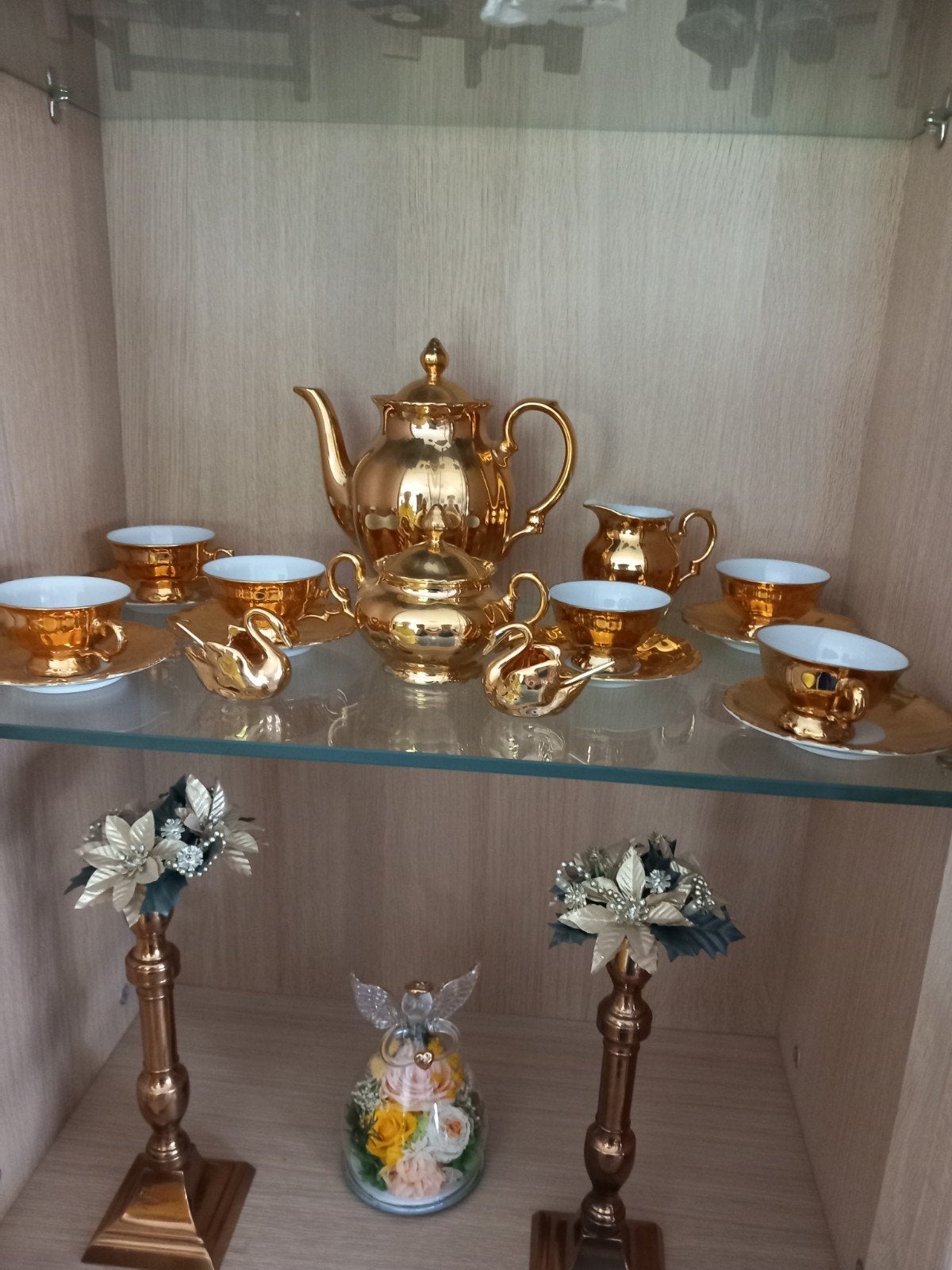 goud kleurig thee set, Enlèvement