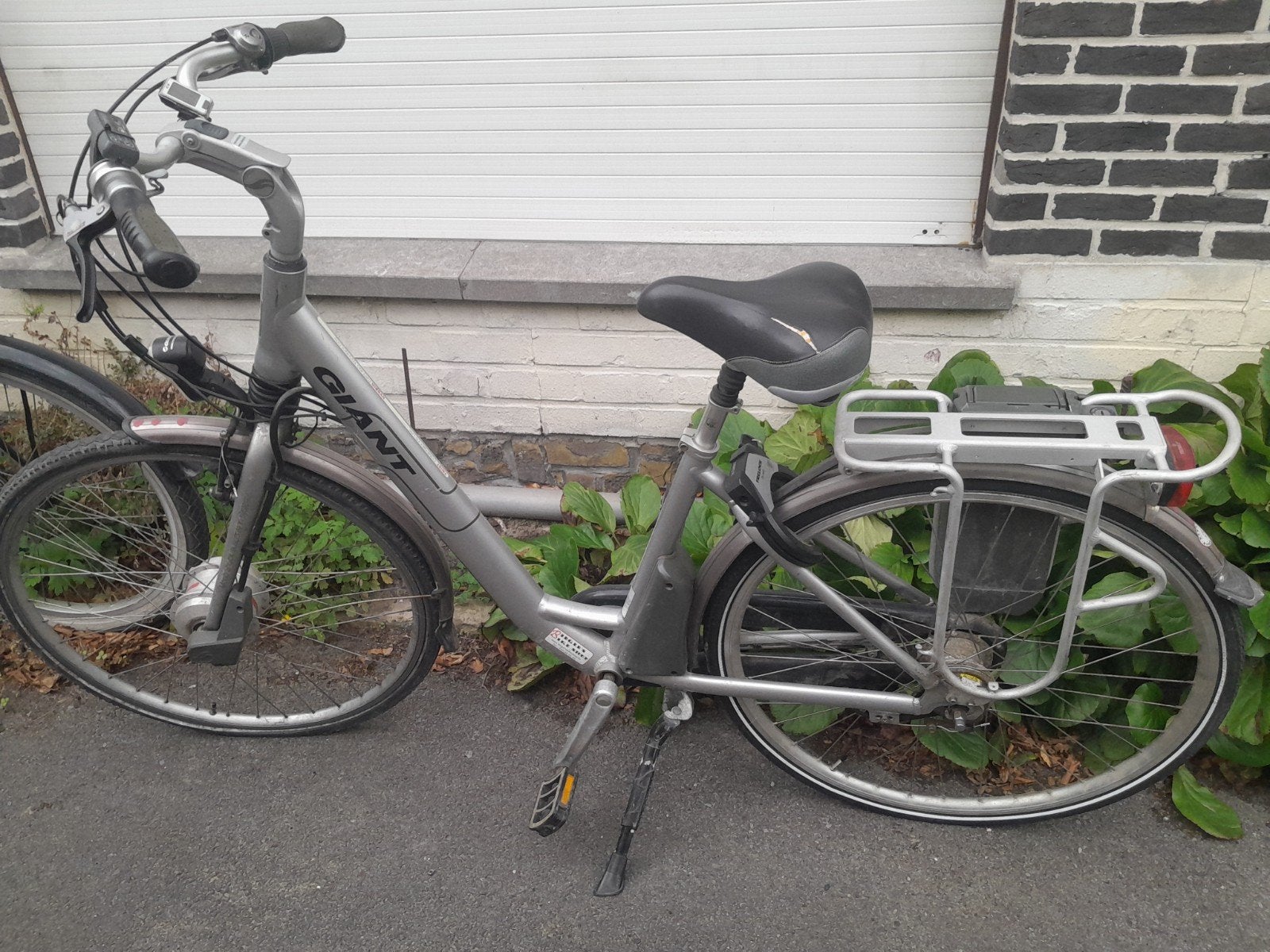 Elektrische fiets plus 2 gewone fietsen, Ophalen