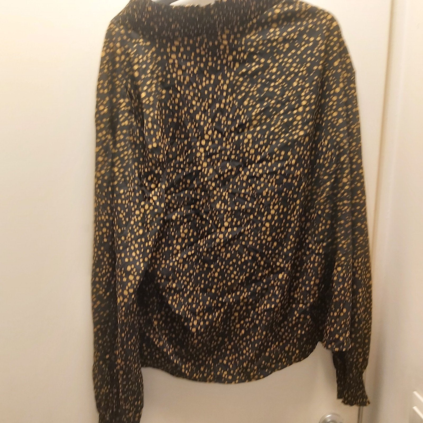 Tres belles  blouse  nickel, Ophalen
