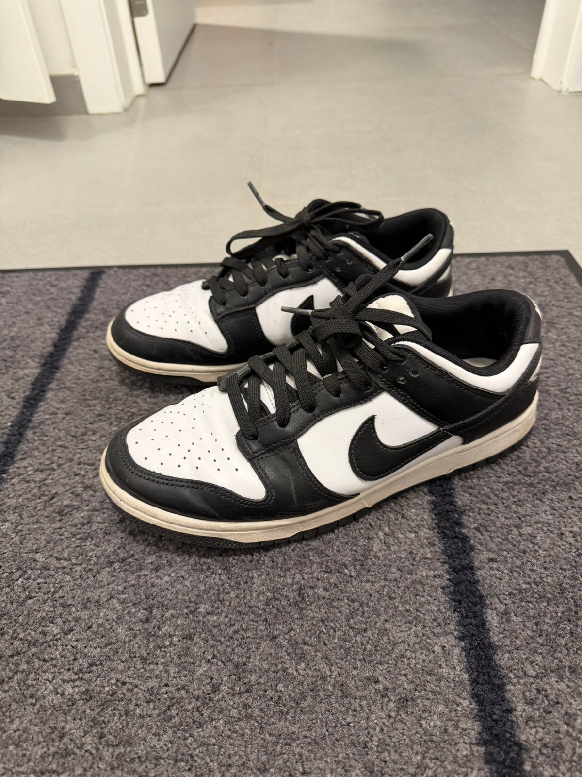 Nike Dunk Low Retro, Ophalen