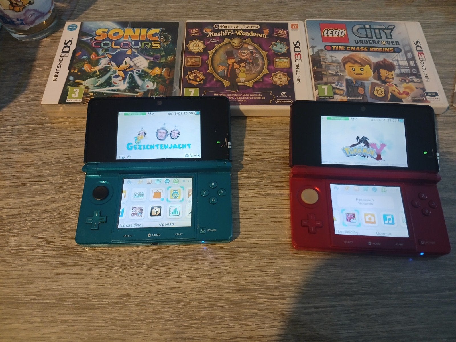 Nintendo 3DS Set: 2x Console (Aqua Blue & Flame Red) + 4 Gam, Games en Spelcomputers, Ophalen, 3DS