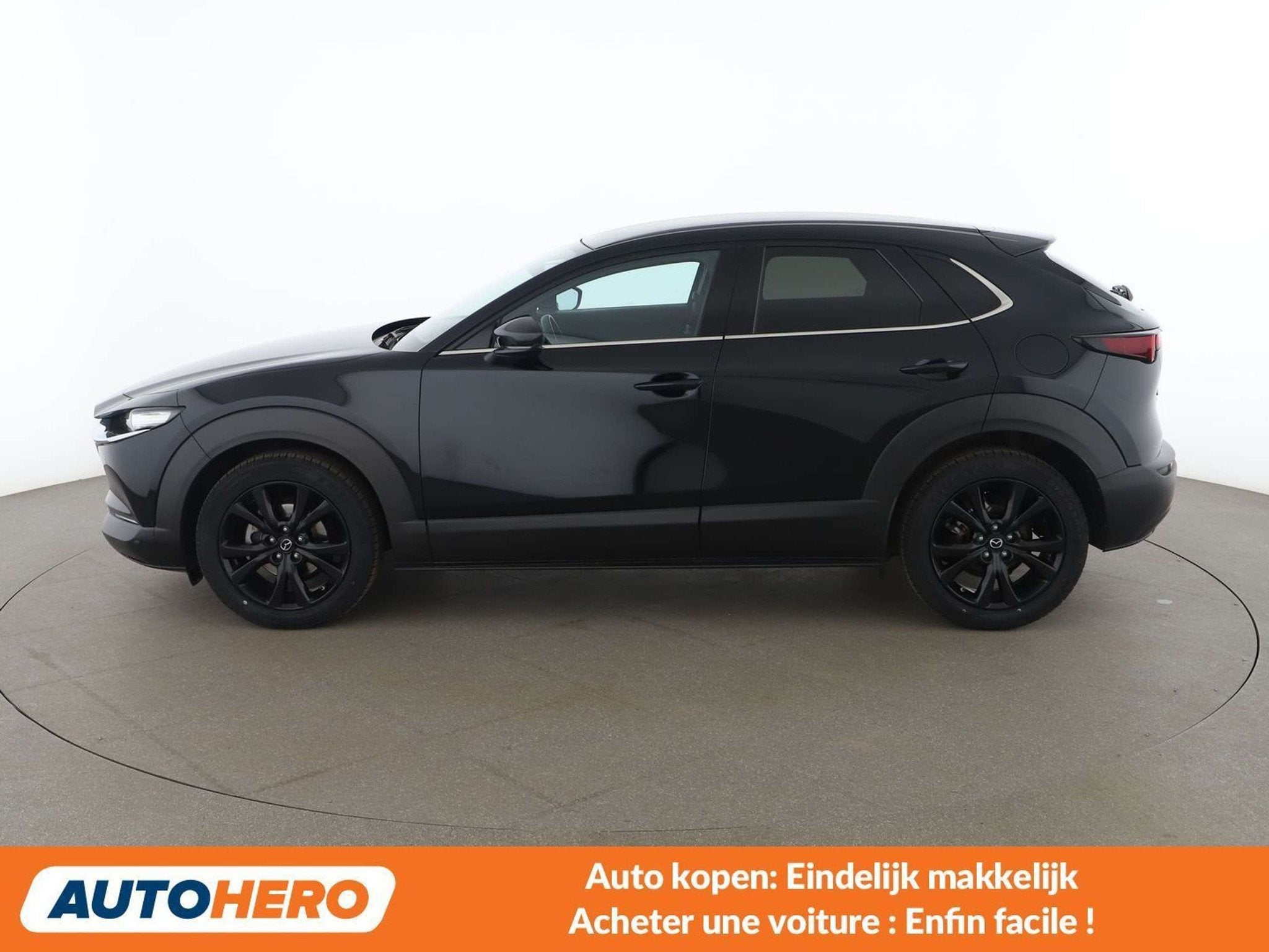 Mazda CX-30 2.0 Skyactiv G Mild-Hybrid Homura 2WD (bj 2024), Auto's, Mazda, 1998 cc, Stof, Gebruikt, Zwart