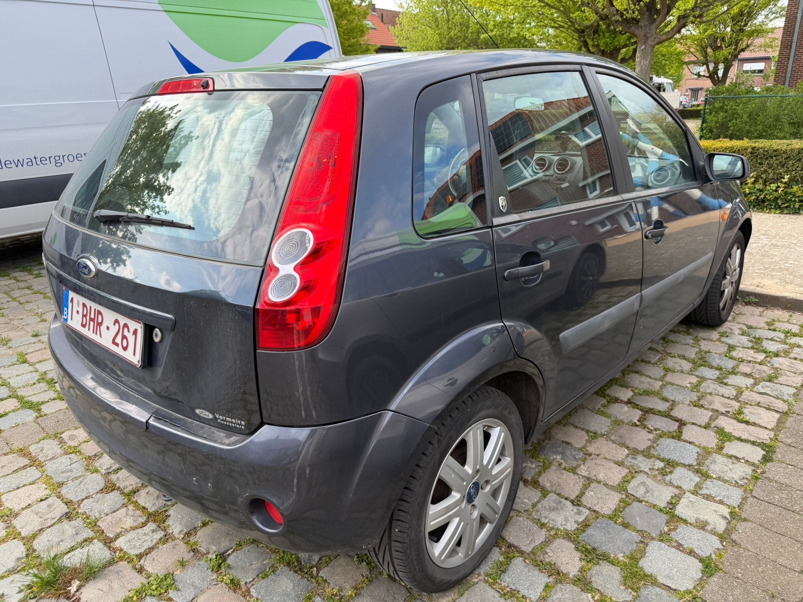 Ford Fiesta 1.3 Ghia benzine, airco, 5 deurs, vlot autootje, Electronic Stability Program (ESP), Leder, Particulier, Euro 4
