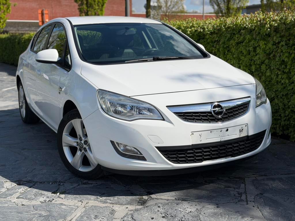 Opel Astra 1.4Benzine/133.000km's/Garantie, Auto's, Voorwielaandrijving, 4 cilinders, Leder en Stof, Wit