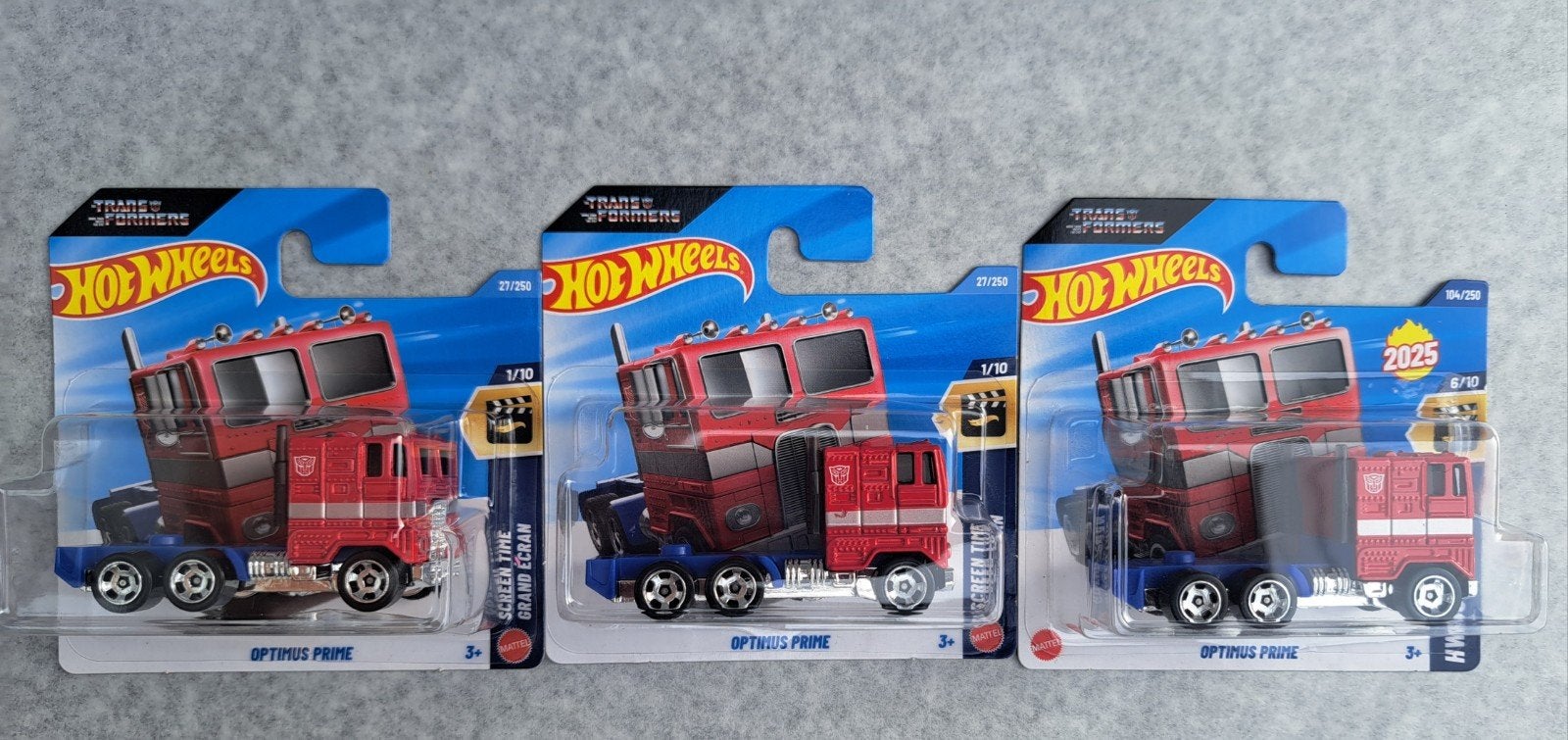 3x camion optimus prime hotwheels, Enlèvement ou Envoi, Comme neuf, Voiture