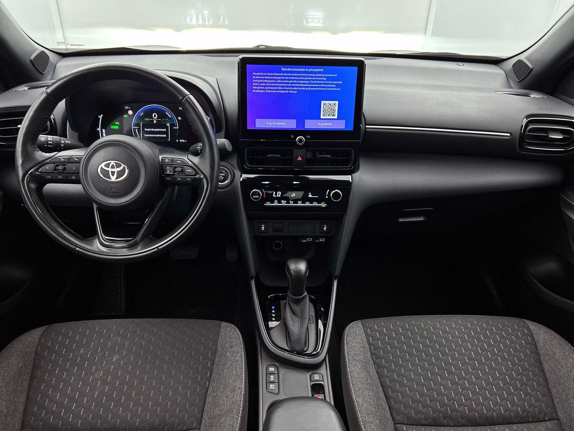 Toyota Yaris Cross 1.5 VVT-ie Hybrid 85kW Dynamic CVT, Auto's, Toyota, Dealer onderhouden, Stof, Gebruikt, 750 kg