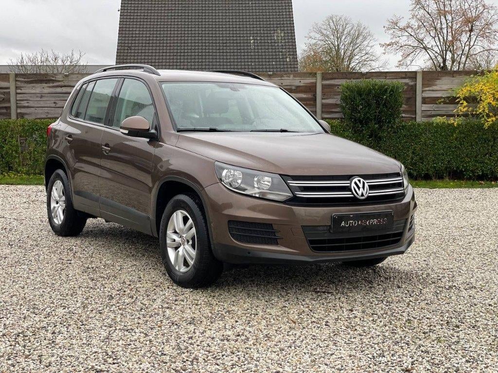 VolkswagenTiguan BlueMotion/Tdi/Navi/Clima/Cruise/Garantie/*, Monovolume, 4 cilinders, Bruin, Start-stop-systeem