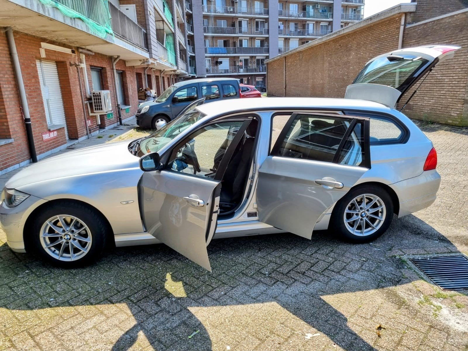 BMW 318i Touring E91 2.0 Benzine Euro 5 LEZ OK. GEEN KEURING, Auto's, BMW, Euro 5, Zwart, Bedrijf, 5 deurs