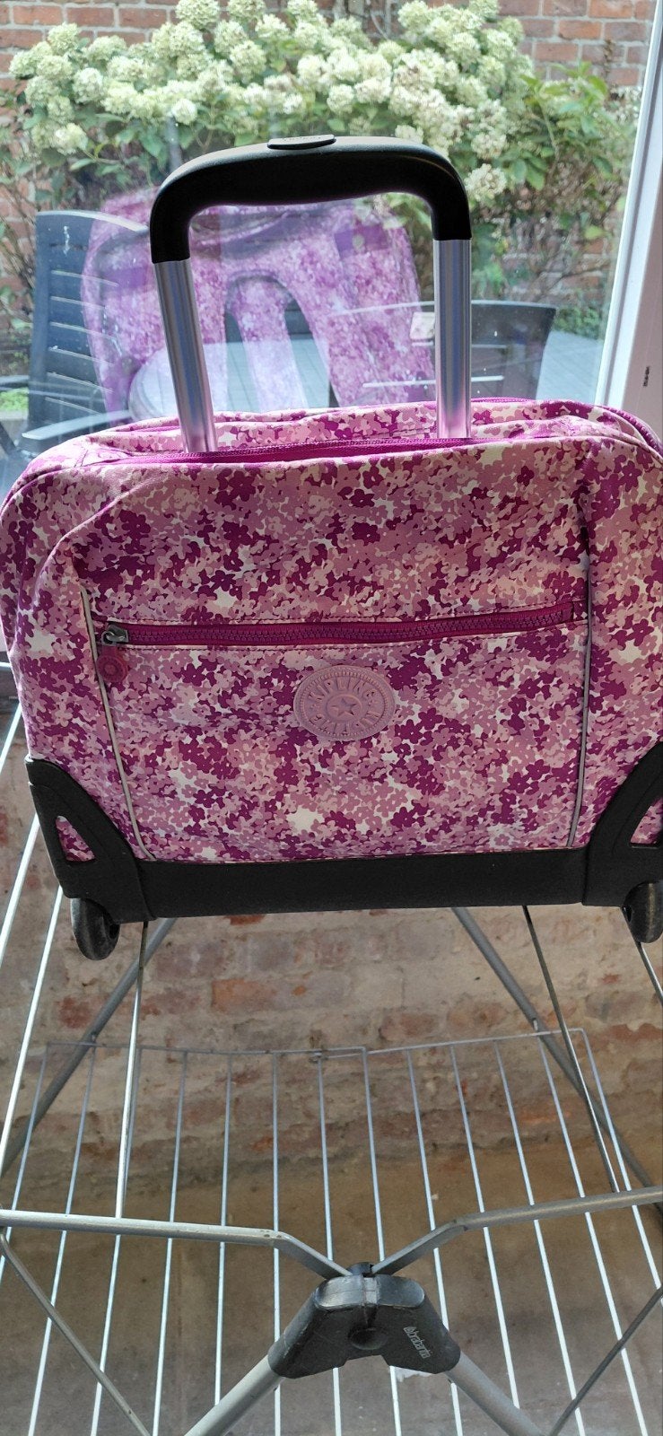 kipling trolley boekentas, Ophalen