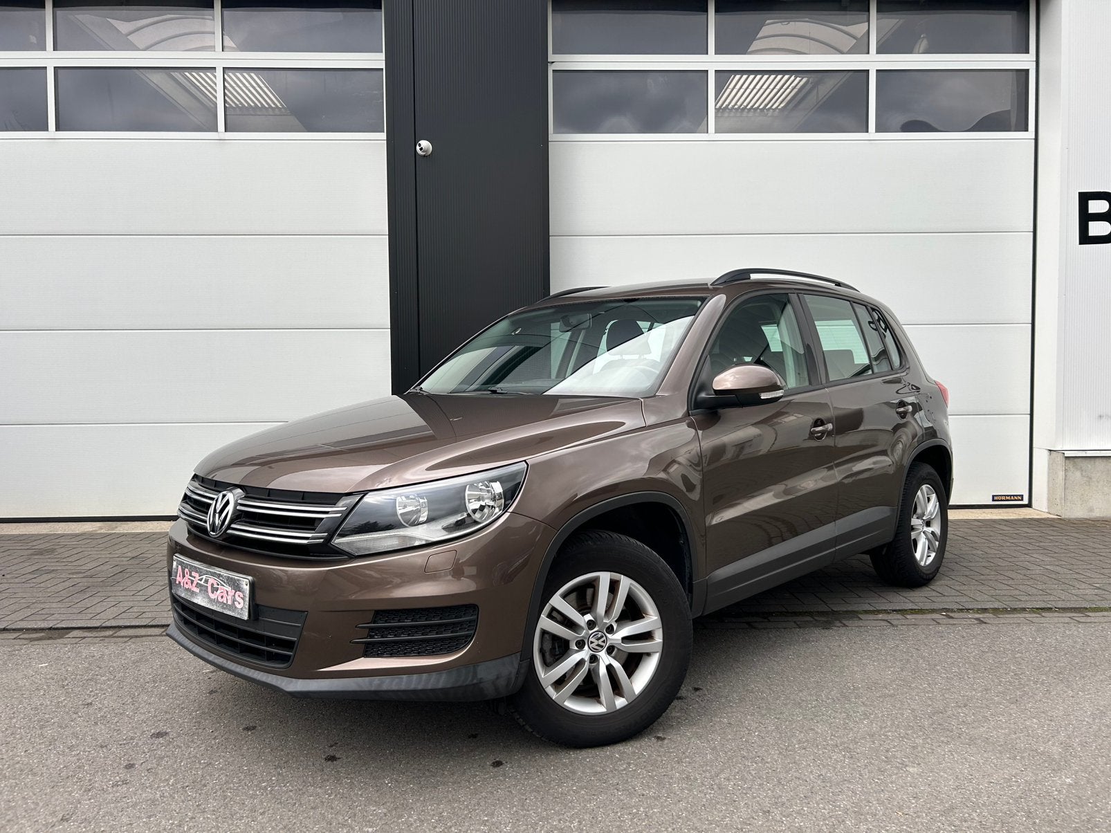 Volkswagen Tiguan 1.4 TSI BlueMotion perfecte staat, Auto's, Volkswagen, Euro 5, Stof, Zwart, Bruin