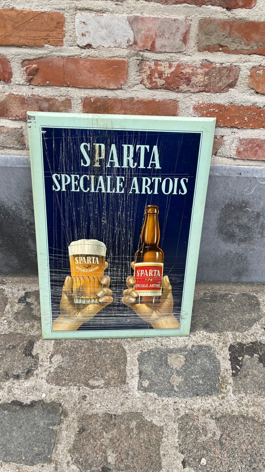 Artois sparta blikken bord., Ophalen of Verzenden, Gebruikt, Reclamebord, Plaat of Schild, Stella Artois