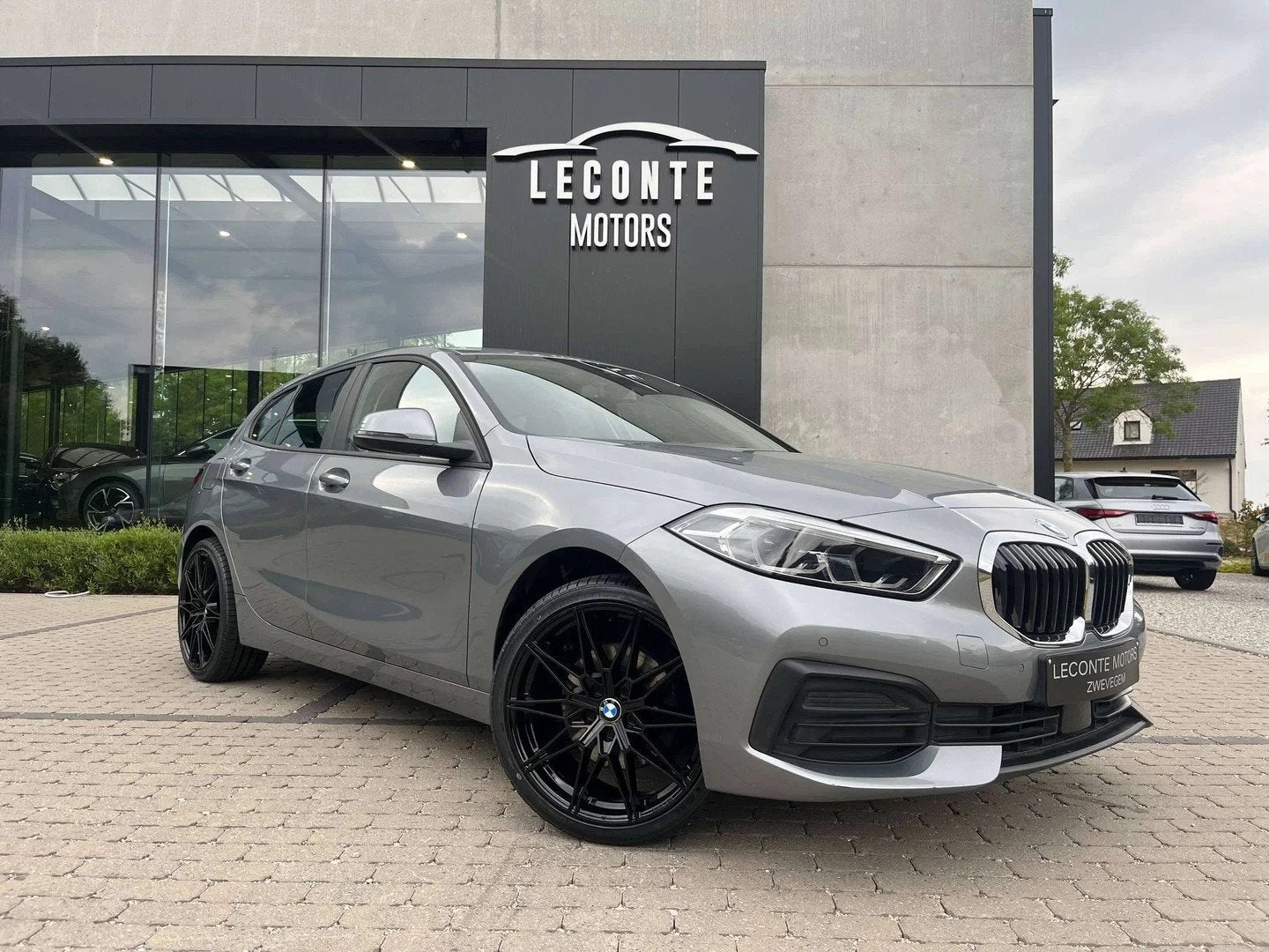 BMW 1 Serie 116 116iA Hatchback Full-LED/Navigatie/Carplay/P, Auto's, BMW, Automaat, Gebruikt, Zwart, Lichtsensor