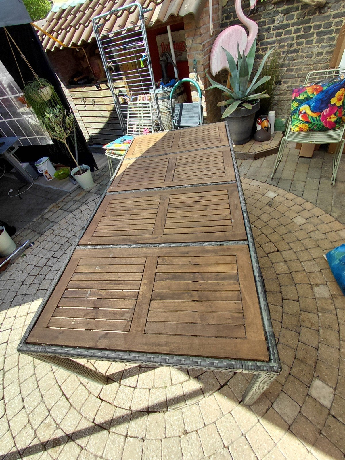 Grote tuintafel., Ophalen