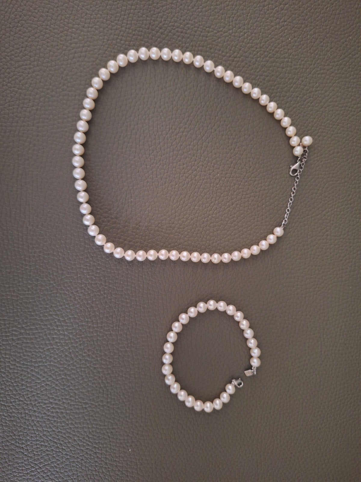 925 zilver parelhalsketting en parelsarmband merk Victoria, Ophalen of Verzenden, Zilver, Zilver