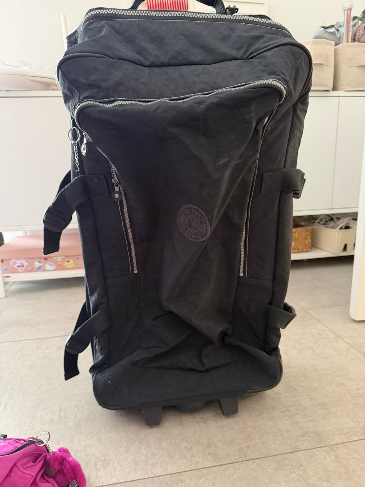Kipling, Ophalen, Zo goed als nieuw, Uitschuifbare handgreep