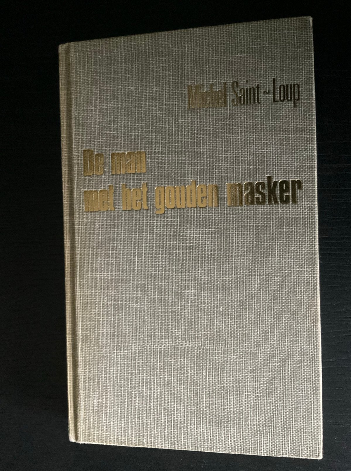 De man met het gouden masker - Michel Saint-Loup, Boeken, Avontuur en Actie, Verzenden, Zo goed als nieuw