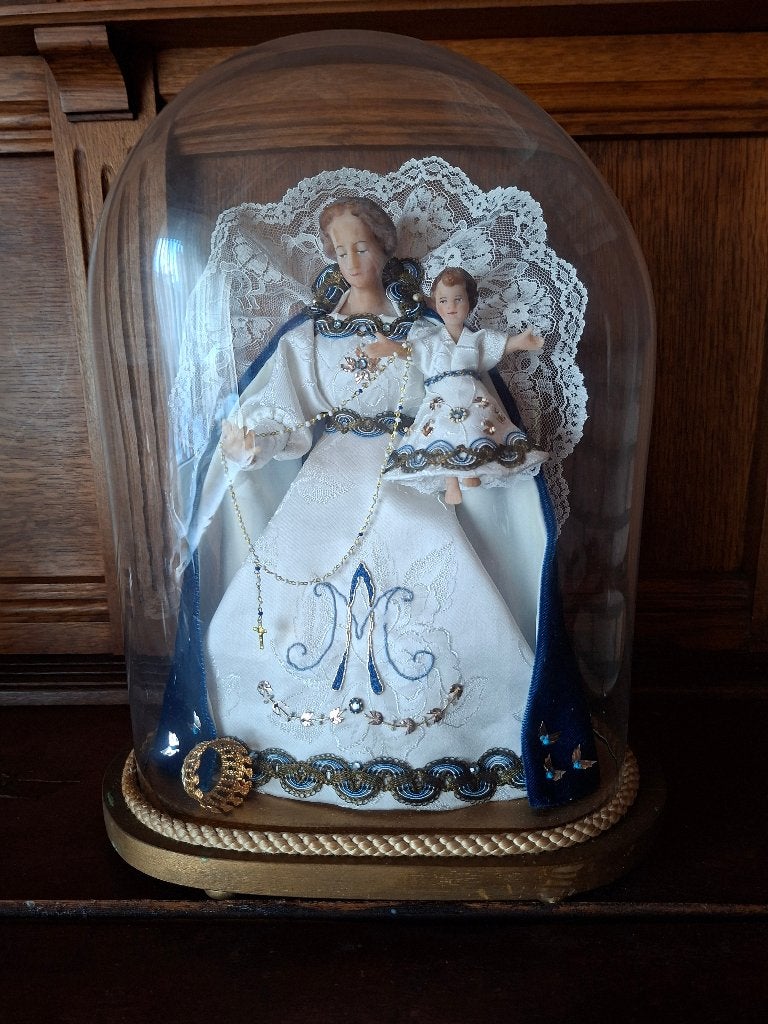 wassen mariabeeld onder stolp, Ophalen