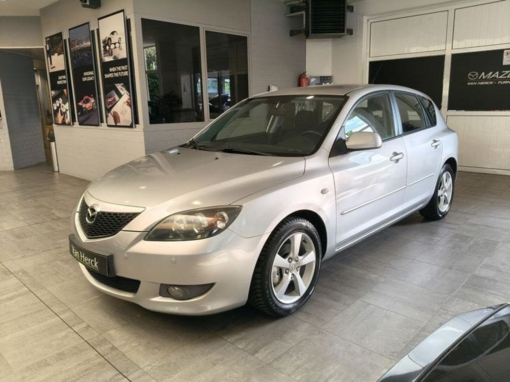 Mazda Protege 1.6i 16V Active, Auto's, Mazda, 105 pk, Zwart, Bedrijf, 5 deurs