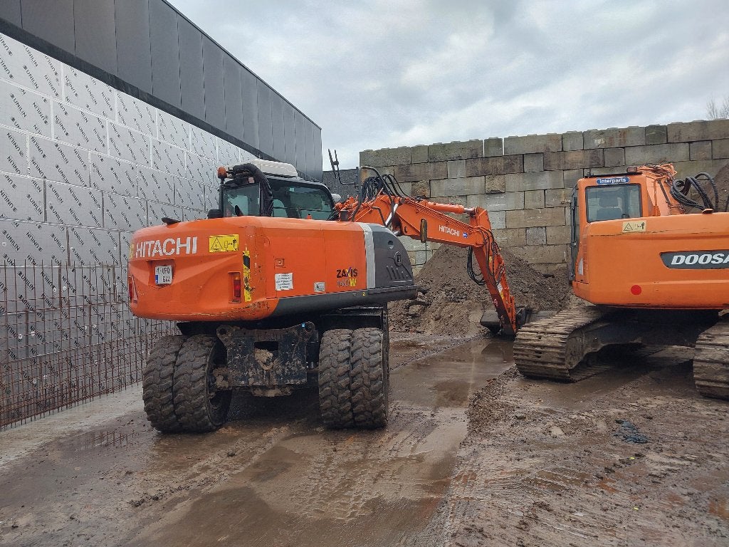 hitachi 140 bandenkraan, Zakelijke goederen, Ophalen of Verzenden, Graafmachine