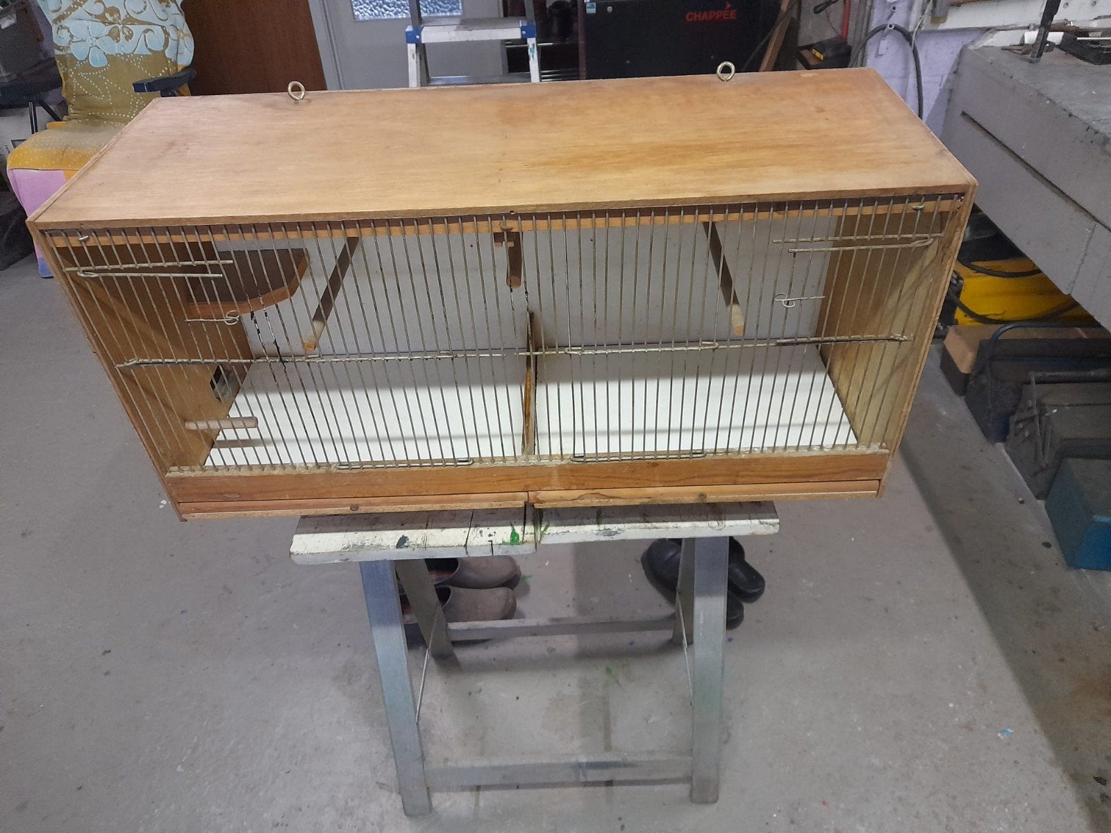 Vogel kweekkooi, Enlèvement, Cage à oiseaux
